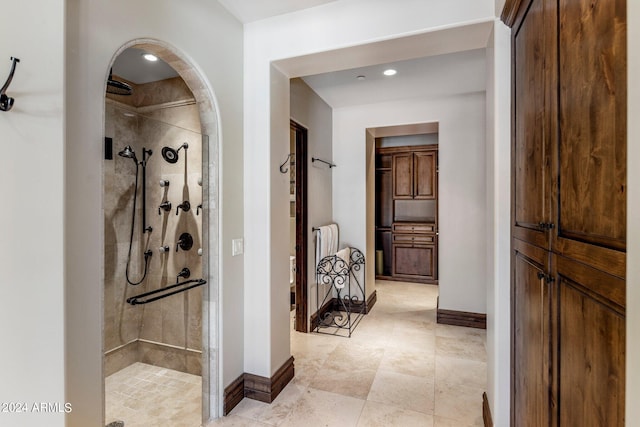 corridor with light tile floors