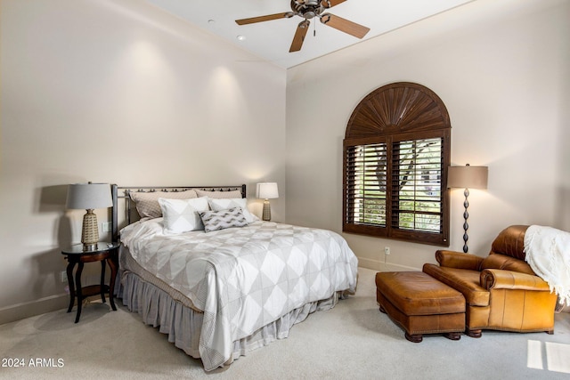 bedroom with ceiling fan and carpet