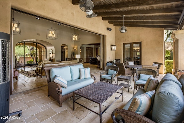 view of patio featuring outdoor lounge area and ceiling fan