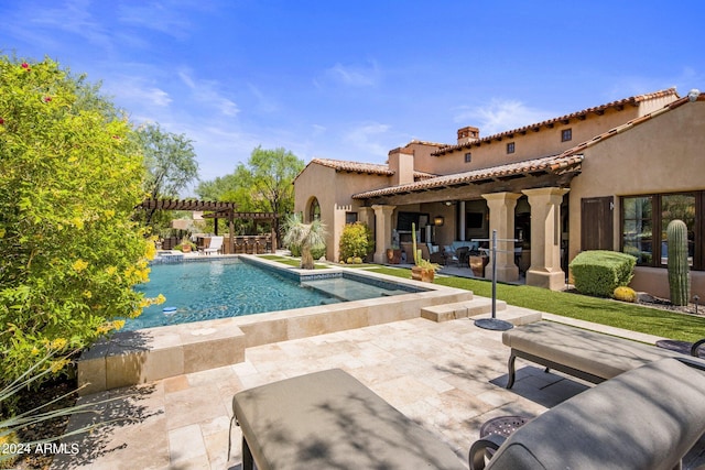 view of pool with a patio and a pergola