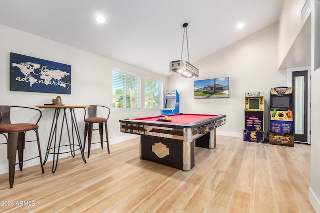 playroom featuring lofted ceiling, light wood-type flooring, and pool table