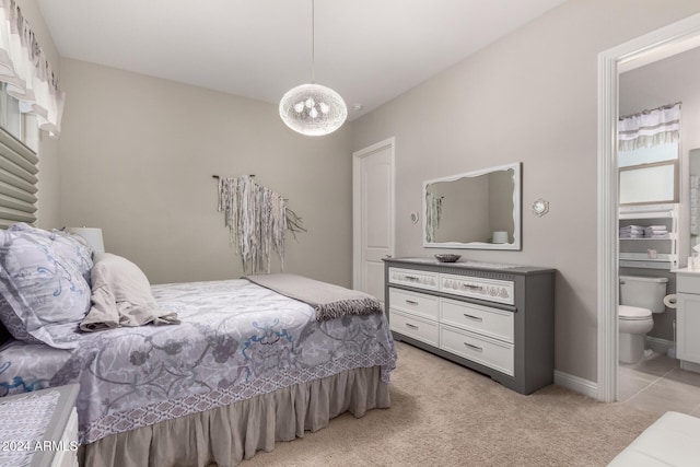 bedroom with light colored carpet