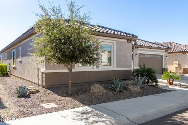 view of front of home with a garage