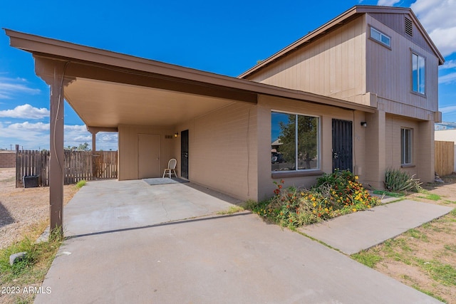 view of front of home with a carport