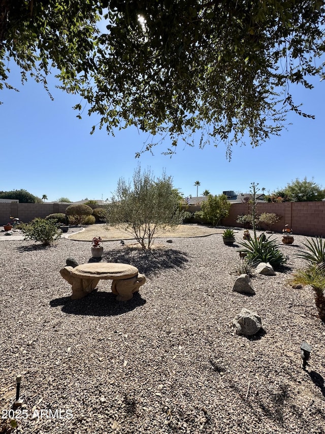 view of yard with fence