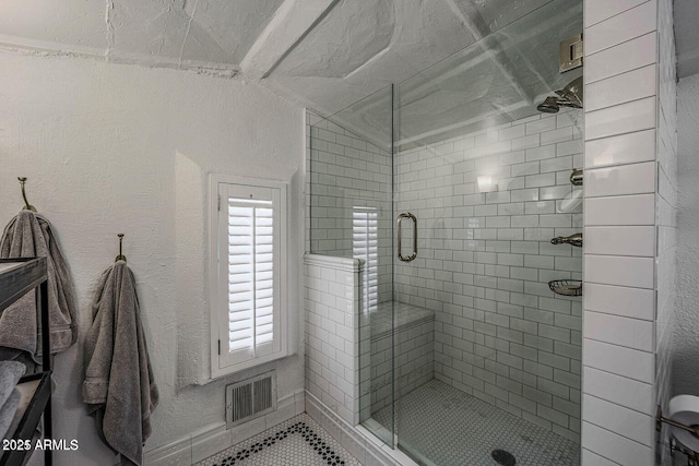 bathroom with walk in shower