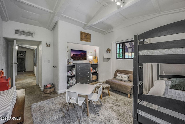 bedroom with vaulted ceiling with beams