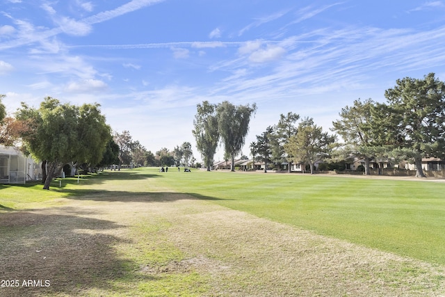 view of home's community featuring a lawn