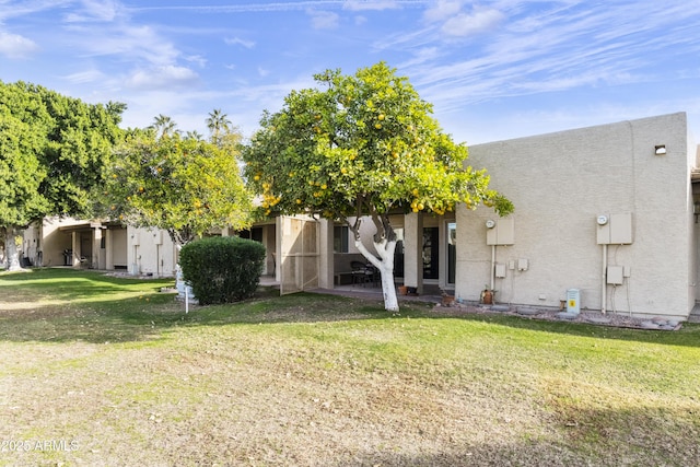 exterior space with a lawn