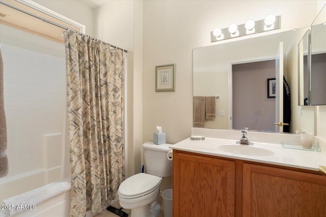 full bathroom featuring vanity, toilet, and shower / bath combo with shower curtain