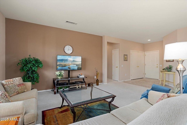 living room featuring light colored carpet