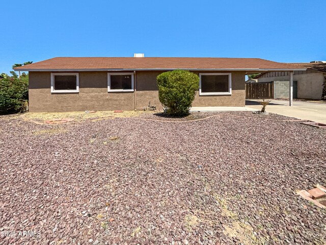 ranch-style house featuring a patio