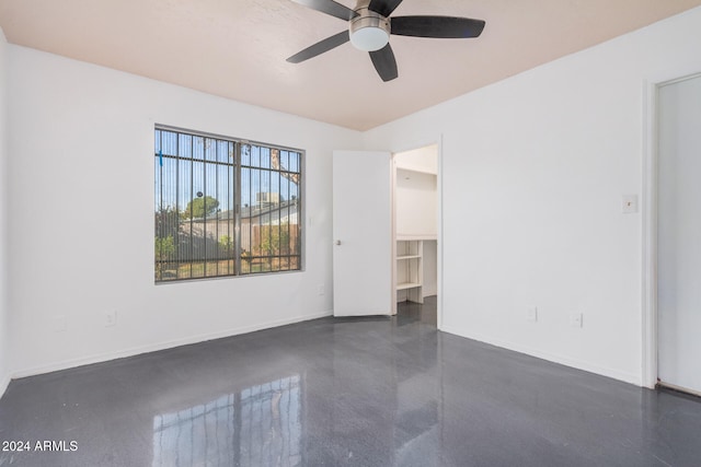 unfurnished room featuring ceiling fan