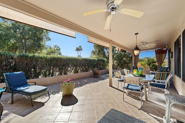 view of patio / terrace featuring ceiling fan