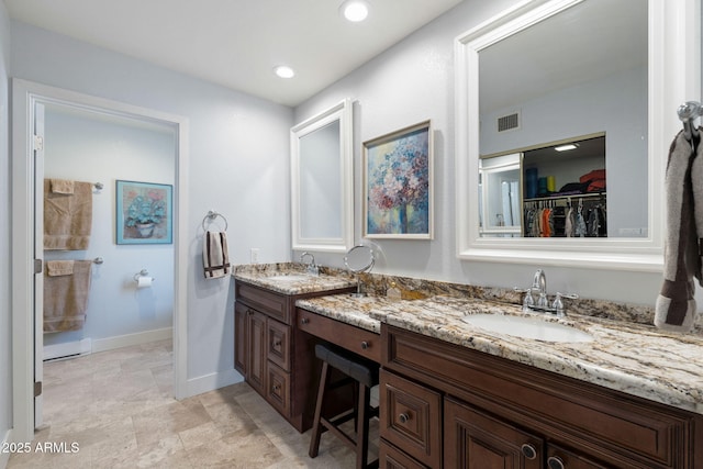 bathroom featuring vanity