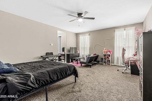 carpeted bedroom with a ceiling fan