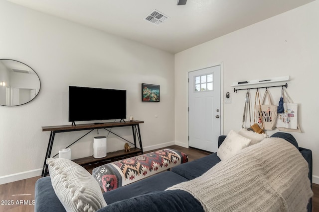 living room featuring dark hardwood / wood-style floors