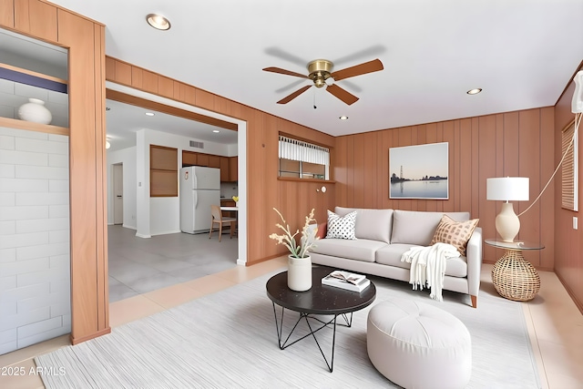 2145 W Cholla St, Phoenix, AZ 85029 - living area with a ceiling fan, light tile patterned floors, recessed lighting, and wood walls