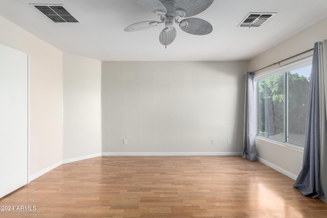 unfurnished room with light hardwood / wood-style floors and ceiling fan