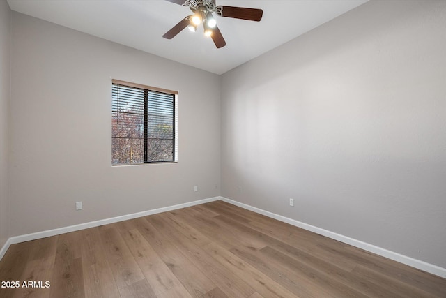 unfurnished room with ceiling fan and light hardwood / wood-style flooring