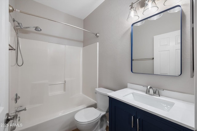 full bathroom featuring tub / shower combination, toilet, and vanity