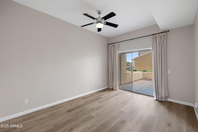 empty room with light hardwood / wood-style floors and ceiling fan