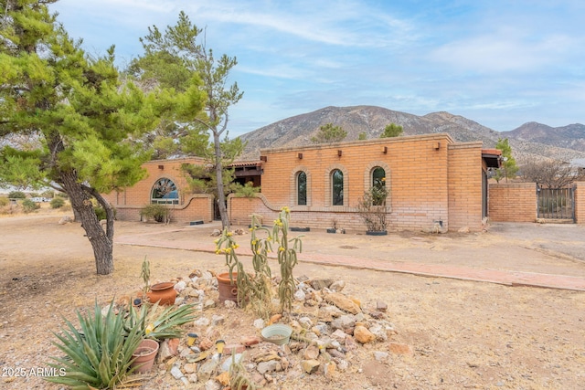 view of front of home with a mountain view