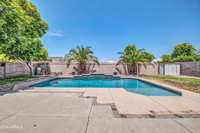 view of swimming pool featuring a patio and pool water feature