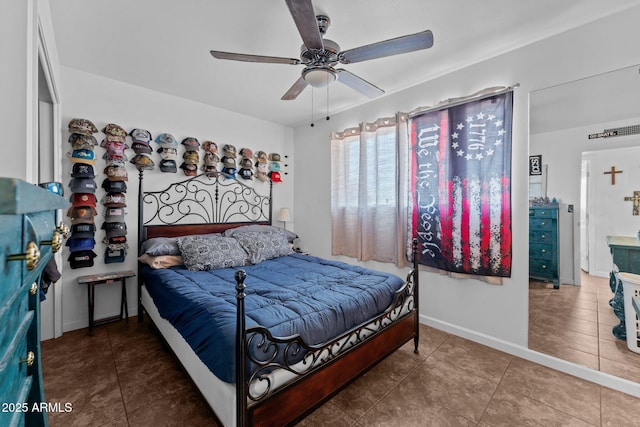 665 W Chaparral Rd, Wickenburg, AZ 85390 - bedroom with tile patterned flooring, ceiling fan, and baseboards