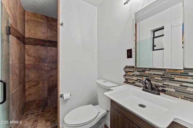 665 W Chaparral Rd, Wickenburg, AZ 85390 - full bathroom featuring vanity, a stall shower, backsplash, and toilet