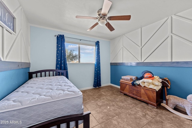 665 W Chaparral Rd, Wickenburg, AZ 85390 - tiled bedroom with ceiling fan and baseboards