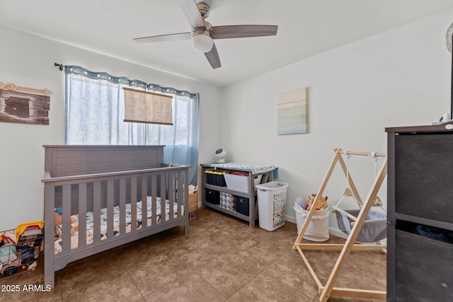 665 W Chaparral Rd, Wickenburg, AZ 85390 - bedroom with a nursery area and a ceiling fan
