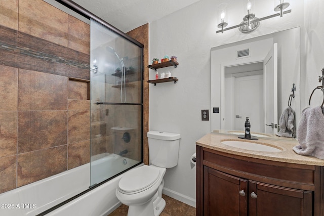 665 W Chaparral Rd, Wickenburg, AZ 85390 - bathroom featuring vanity, toilet, enclosed tub / shower combo, and baseboards