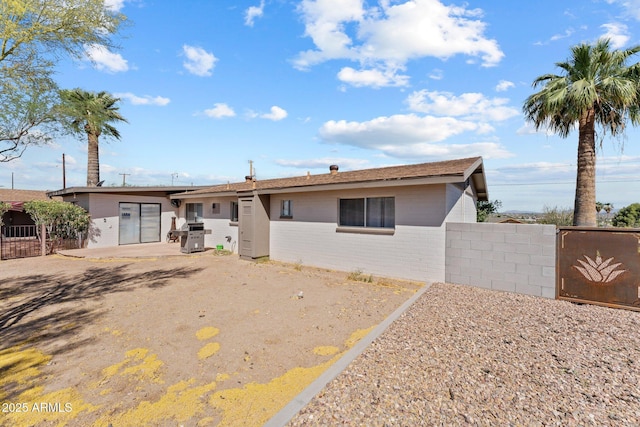 665 W Chaparral Rd, Wickenburg, AZ 85390 - view of front of home featuring brick siding and a patio area