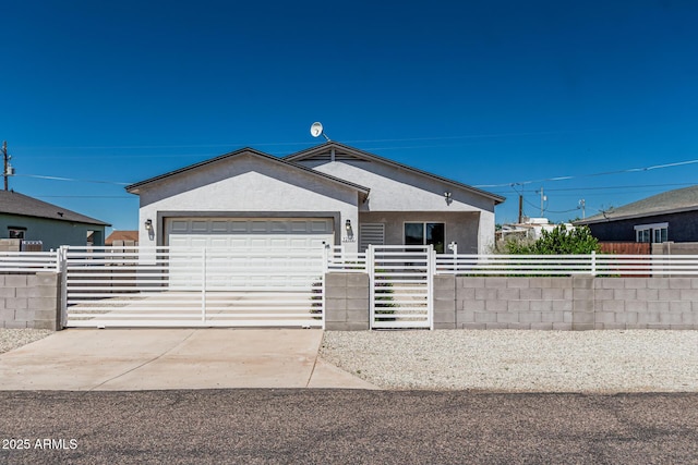 32102 N Walnut St, Wittmann, AZ 85361 - ranch-style home with an attached garage, stucco siding, and concrete driveway