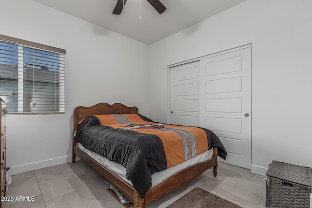 32102 N Walnut St, Wittmann, AZ 85361 - bedroom with ceiling fan, a closet, and baseboards