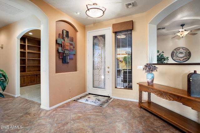 entryway with ceiling fan