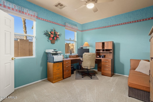 office featuring light colored carpet and ceiling fan