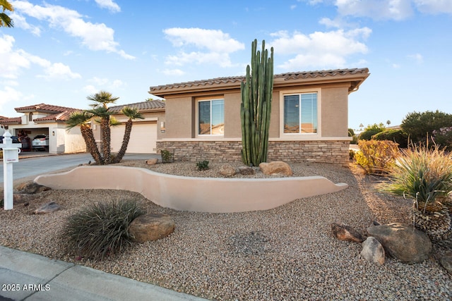 view of front of property featuring a garage