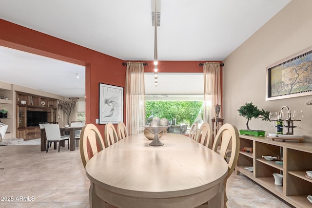 dining space featuring plenty of natural light
