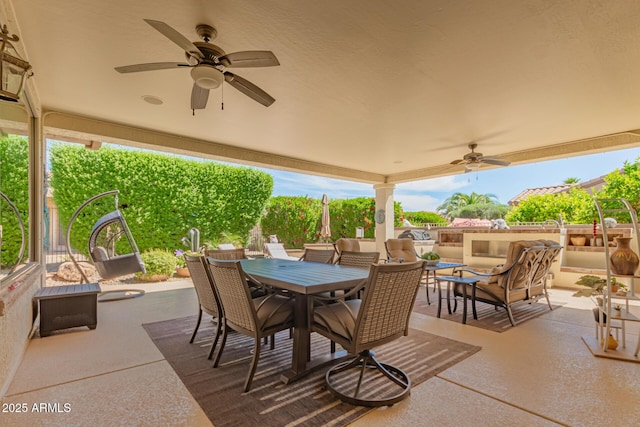 view of patio featuring outdoor dining area, ceiling fan, and outdoor lounge area