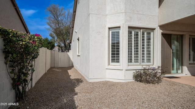 view of home's exterior with a patio area