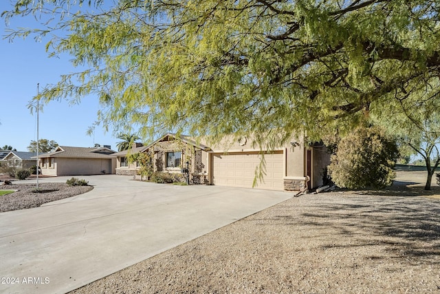 view of front of property with a garage