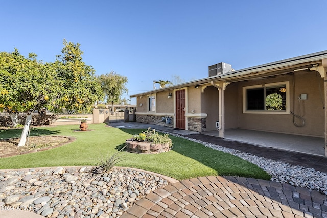 view of yard featuring central AC