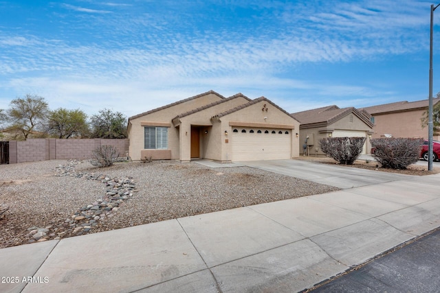 view of front of home featuring fence, driveway, stucco siding, a garage, and a tiled roof