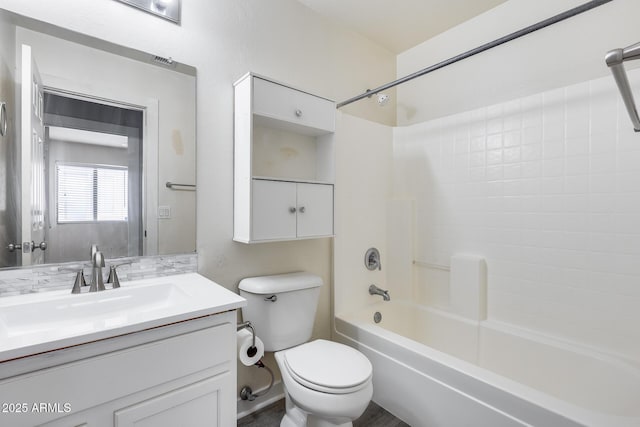 full bath featuring visible vents, toilet, vanity, and bathtub / shower combination