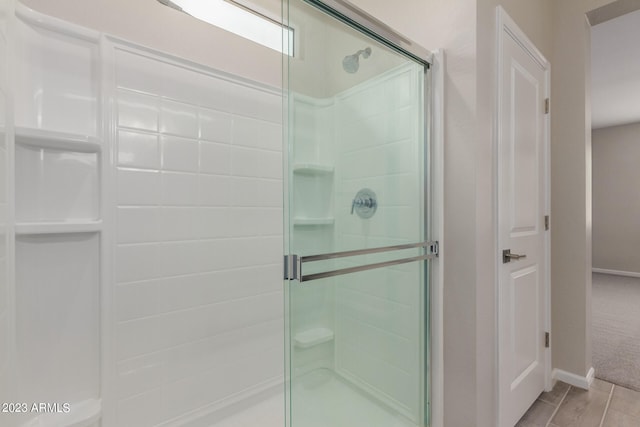 bathroom with an enclosed shower