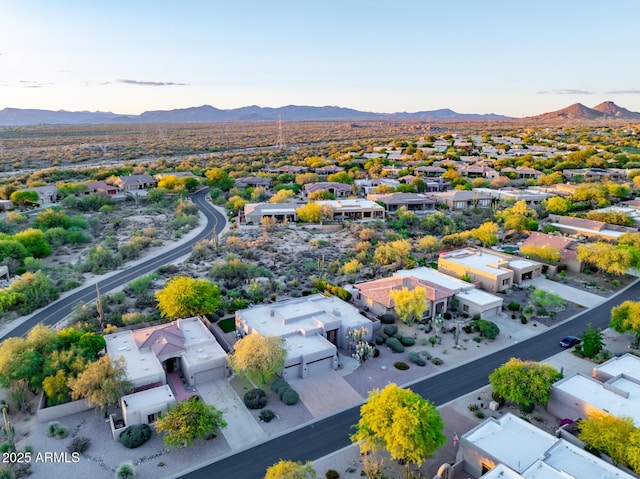 aerial view at dusk of a mountain view and a residential view