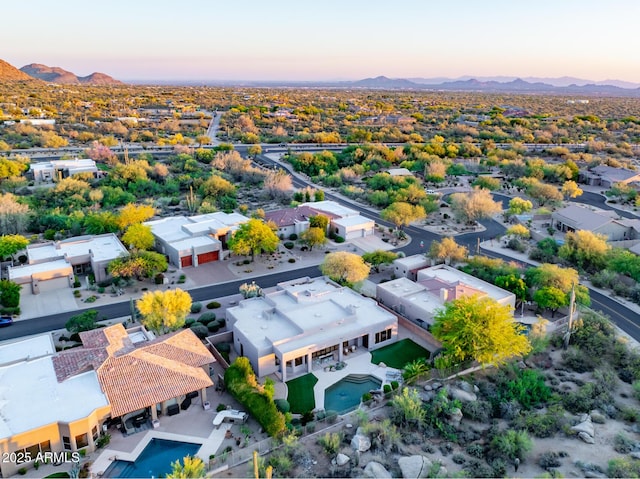 aerial view at dusk of a mountain view and a residential view