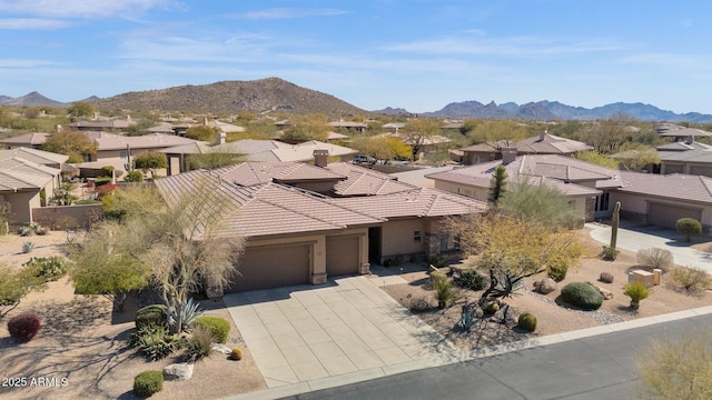 property view of mountains featuring a residential view